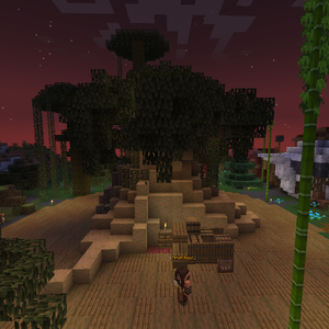 A screenshot of a player-made willow tree in the center of a wooden circle. This tree, the Tree of Wonder, is the center of Mossfall.